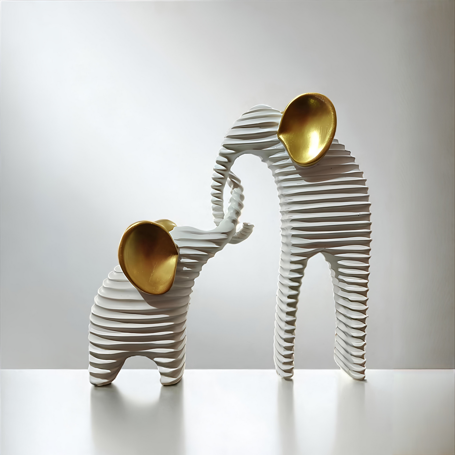 Abstract Elephant Family Sculpture with Gold Accents (Set of 2)
